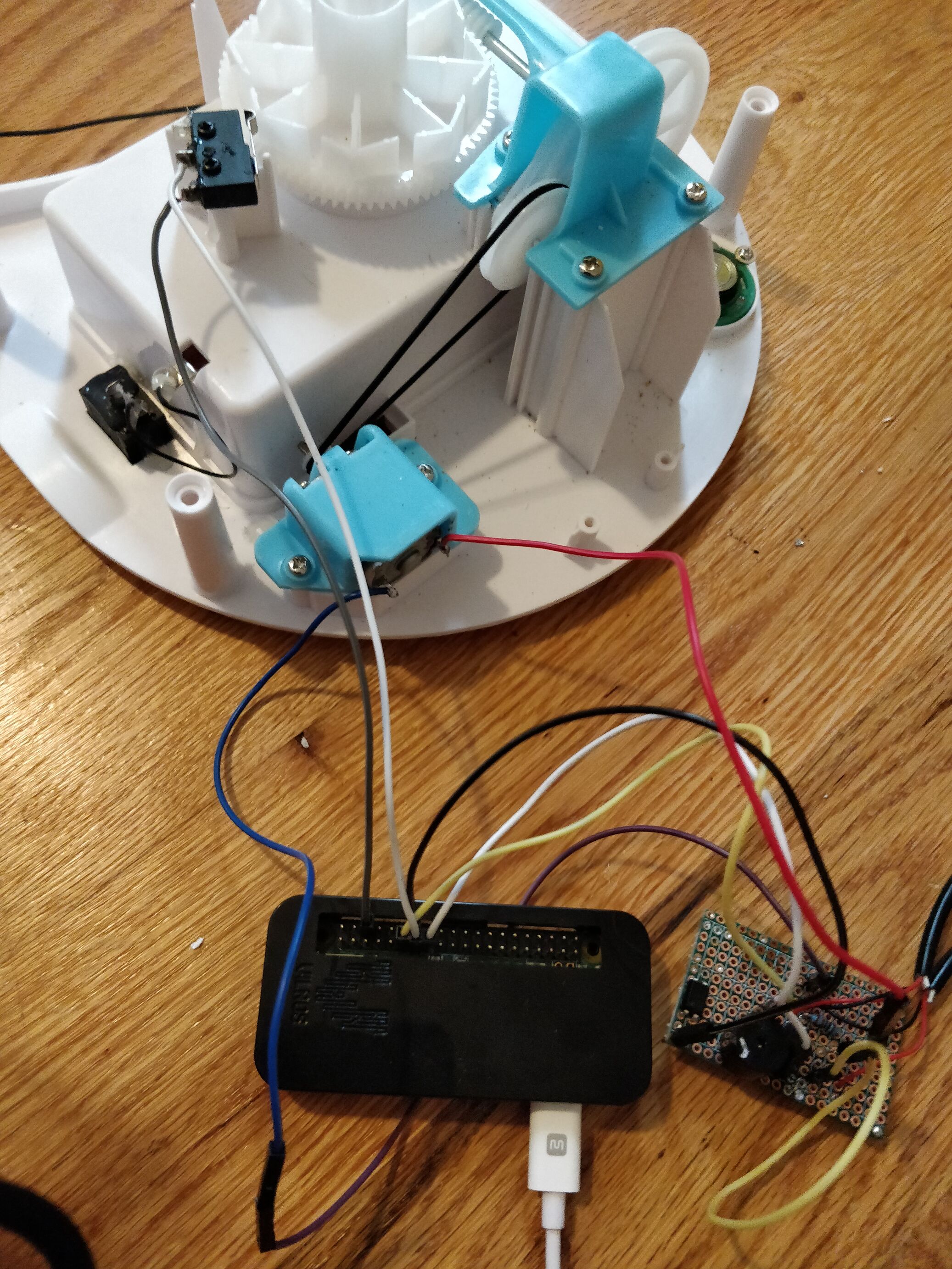 bistrobot internals: the raspberry pi zero w, hooked up to the food dispenser's motor and sensors